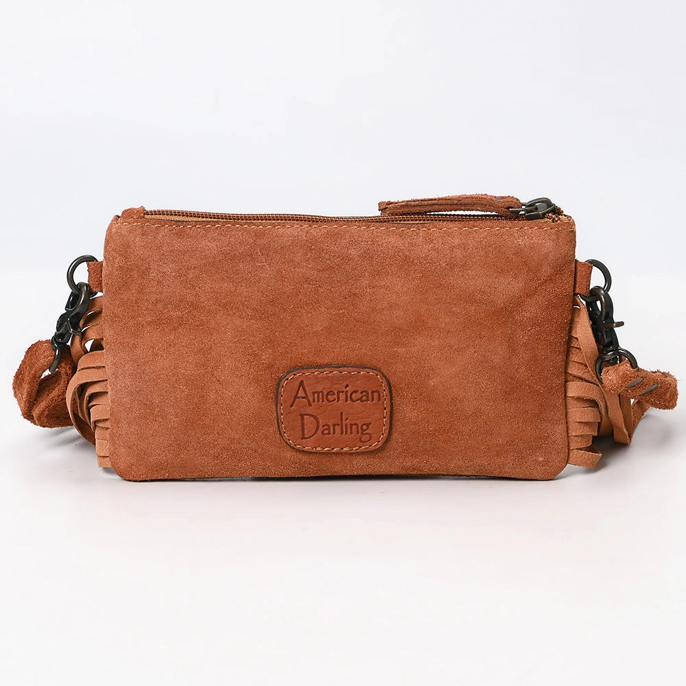 Brown leather handbag with 'American Darling' logo on a white background