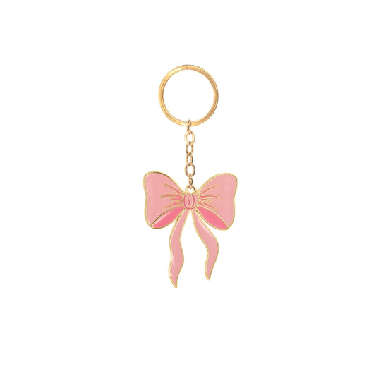 Pink coquette bow keychain with gold ring on a white background