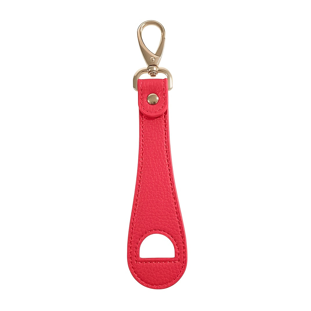 Red bag clip with cap holder and gold clip on a white background