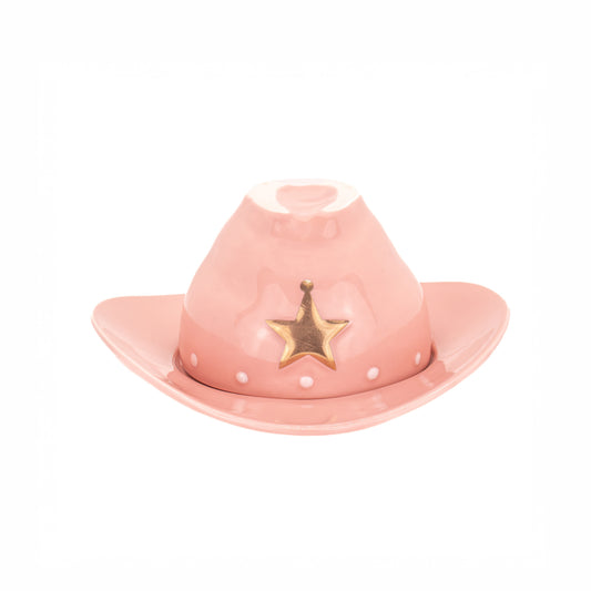 A pink cowboy hat-shaped container or dish with a gold sheriff star emblem on the front, set against a plain white background.