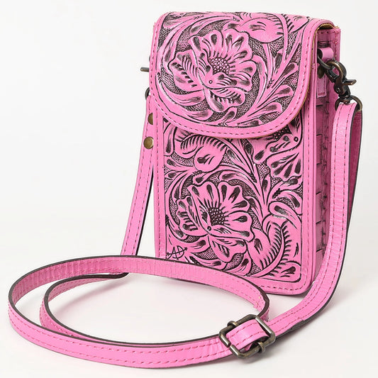 Pink floral embossed crossbody bag on a white background