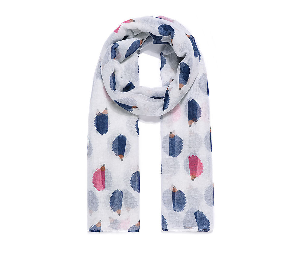 White scarf with navy and pink hedgehogs
