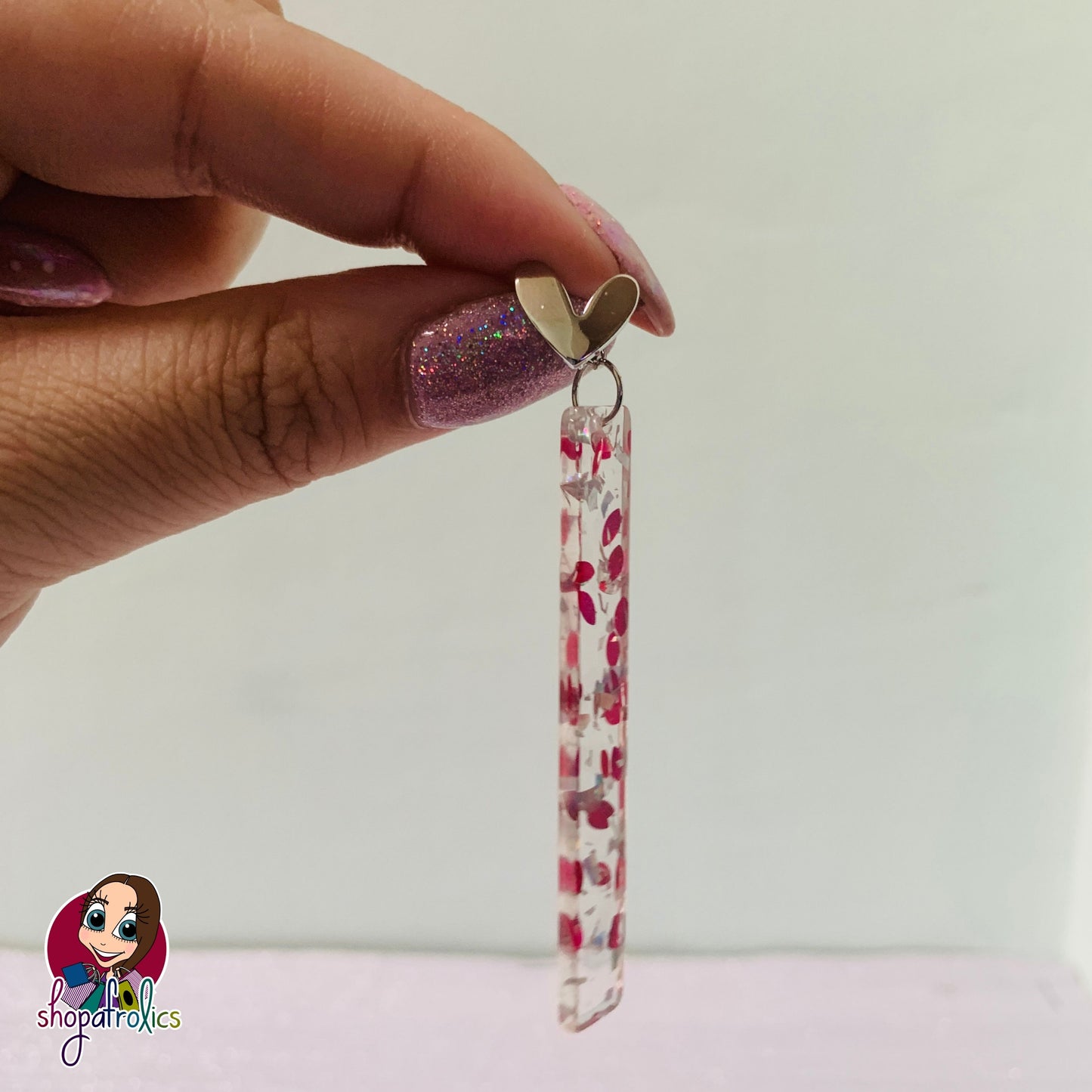 Side angle of confetti drop earrings 