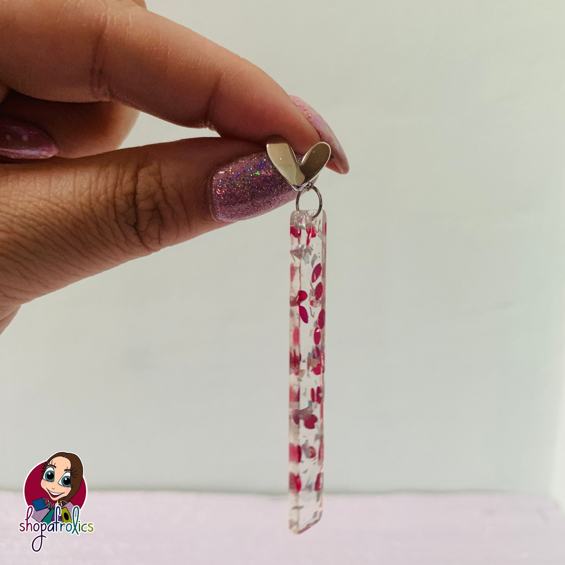 Side angle of confetti drop earrings 