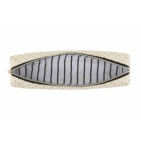 Cream make up brush bag with gold polka dot design.