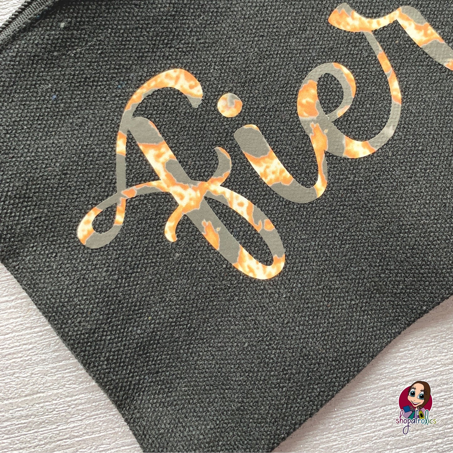 Close up of animal print fierce make up bag