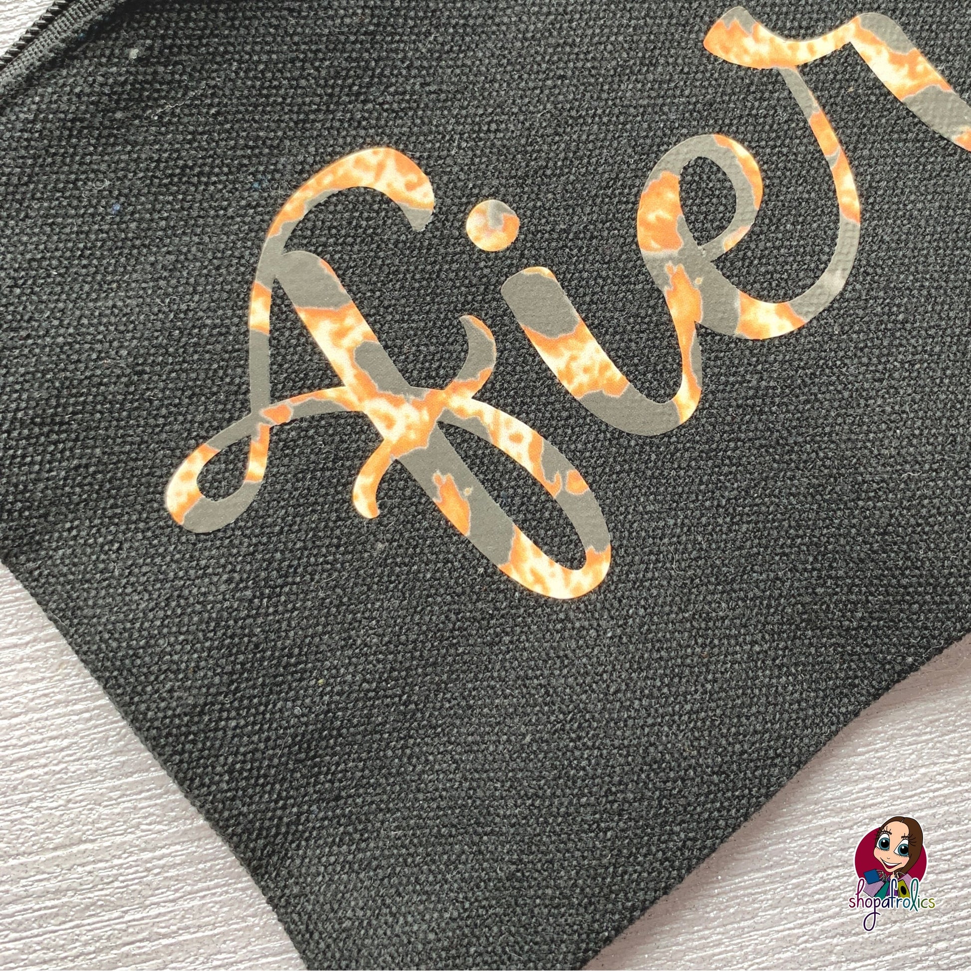 Close up of animal print fierce make up bag