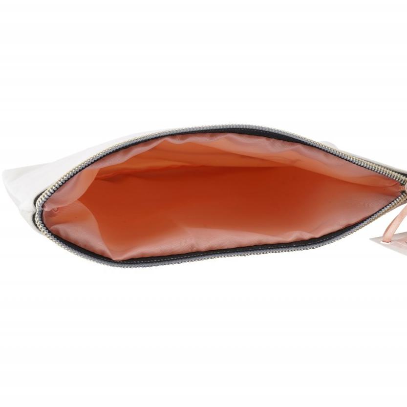 Inside shot of Pretty eye lash design make up bag featuring the phrase Wing It