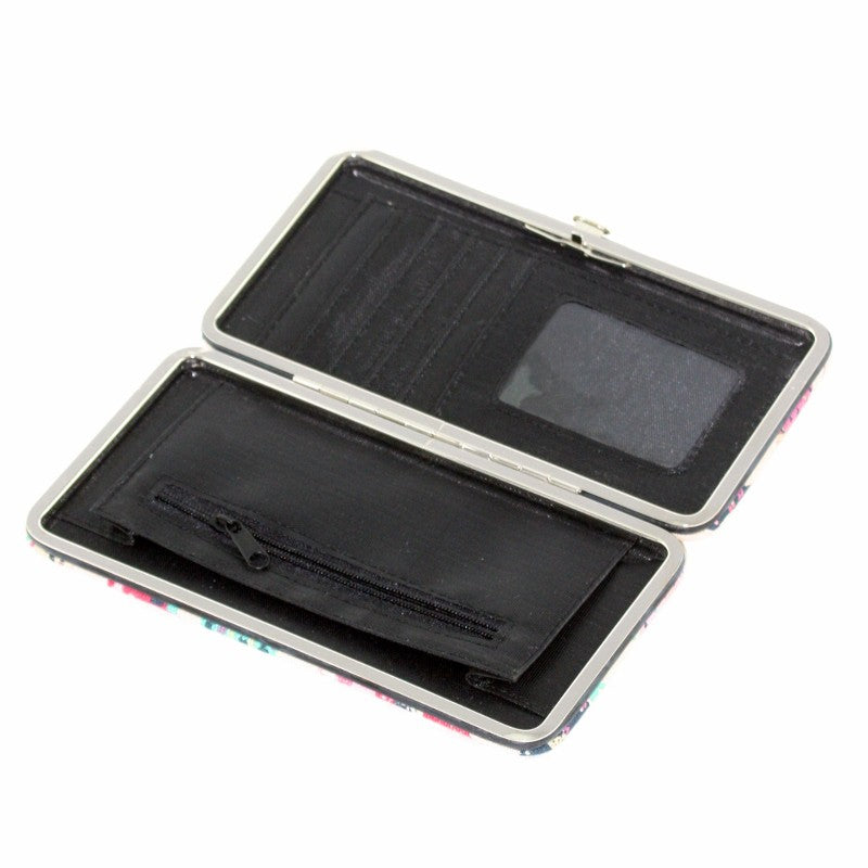 Inside of grey snap shut purse in pretty butterfly design