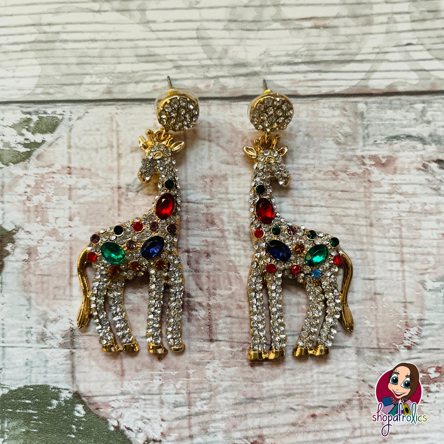 Close up of large giraffe crystal drop earrings