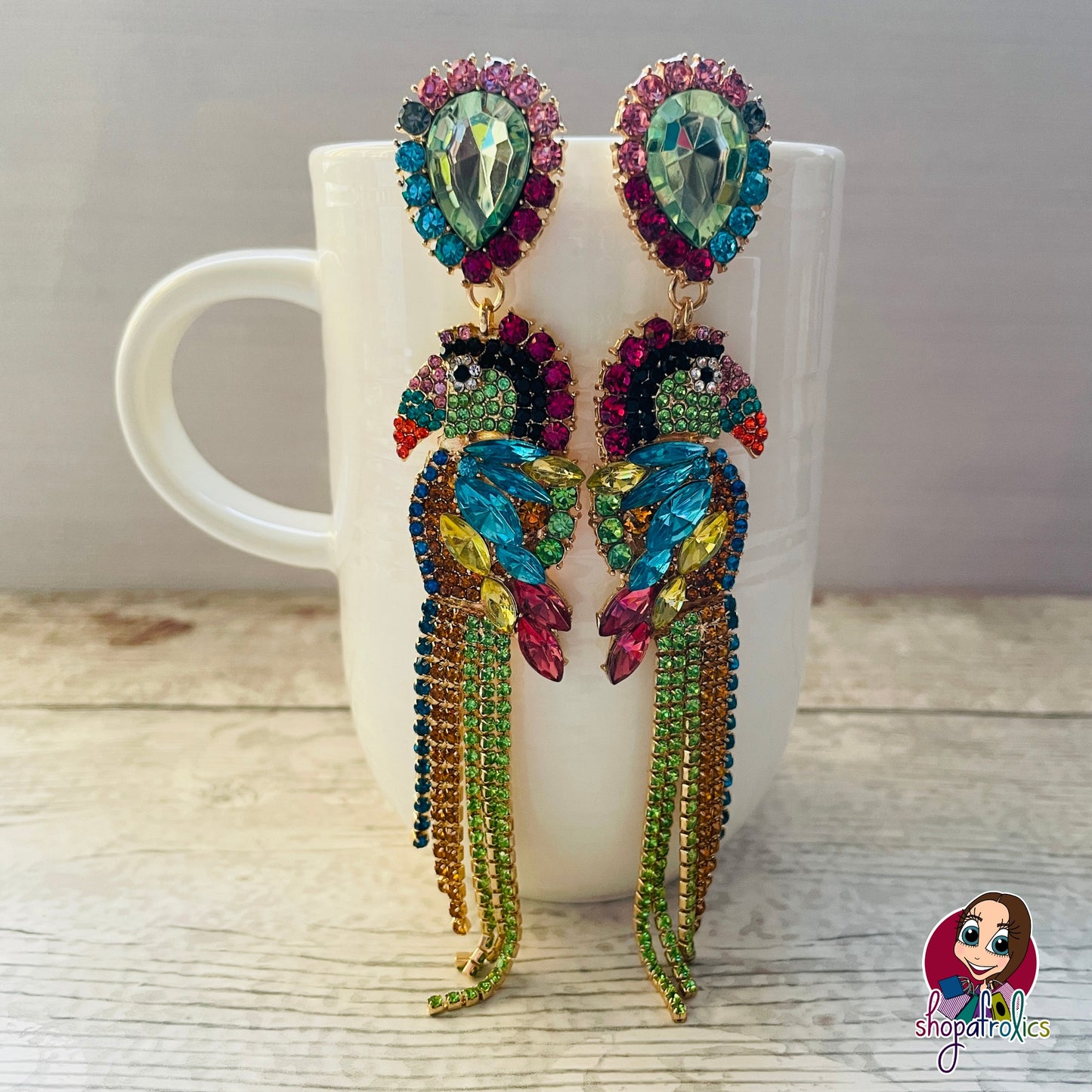 Statement parrot earrings with blue and green crystals