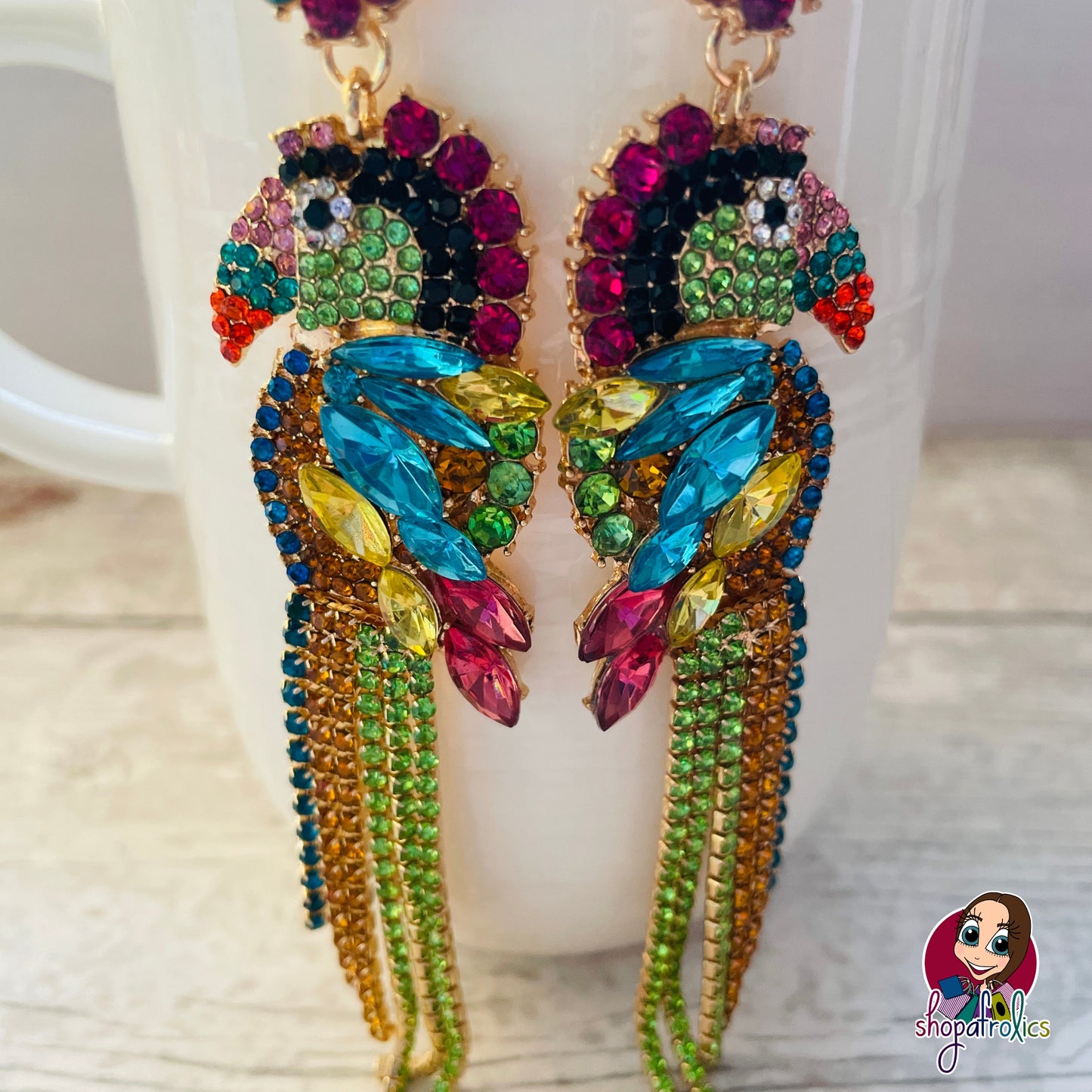 Close up of parrot bird large earrings 