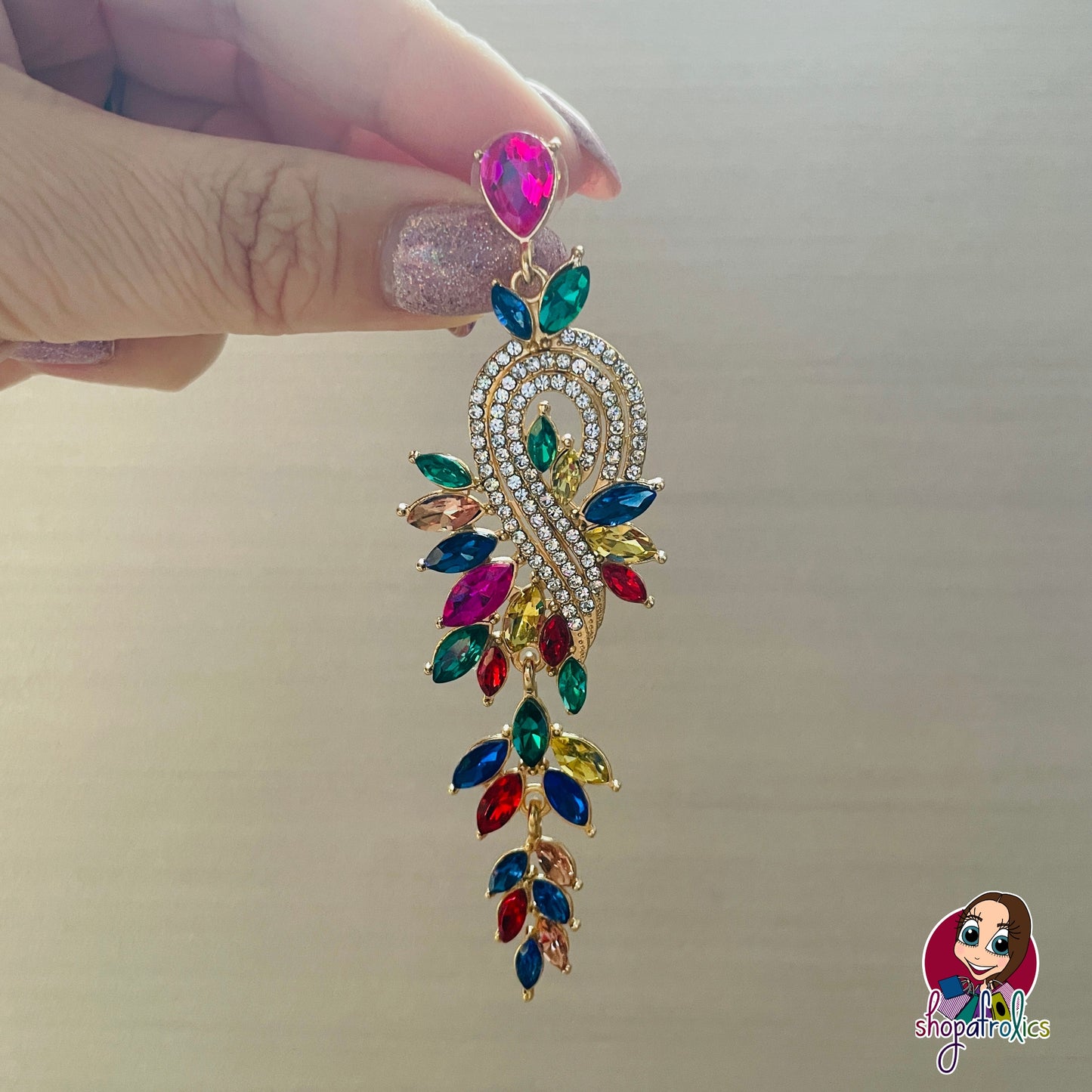 Close up of chandalier multicolour drop earrings 