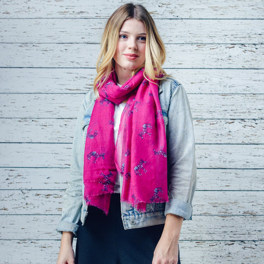 Zebra print on a dark pink background with feathered edge 