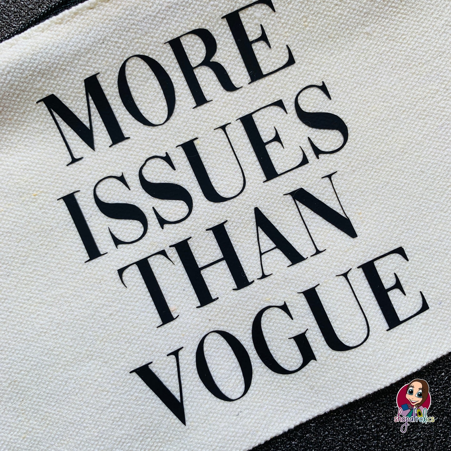 Close up of more issues than vogue make up pouch