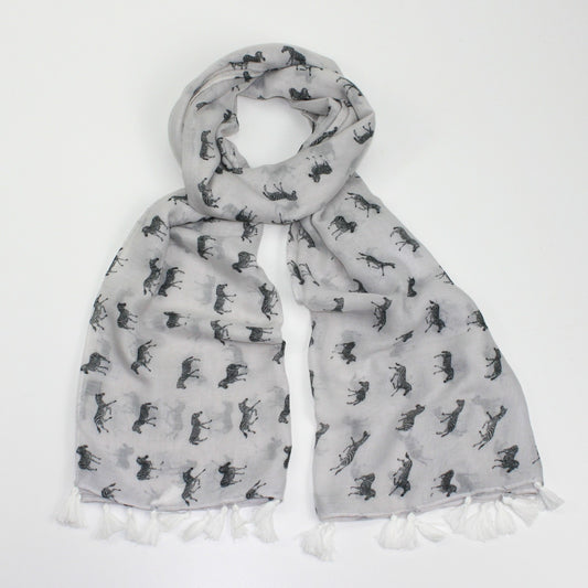 Zebra print on a white background with rolled and tassel edging