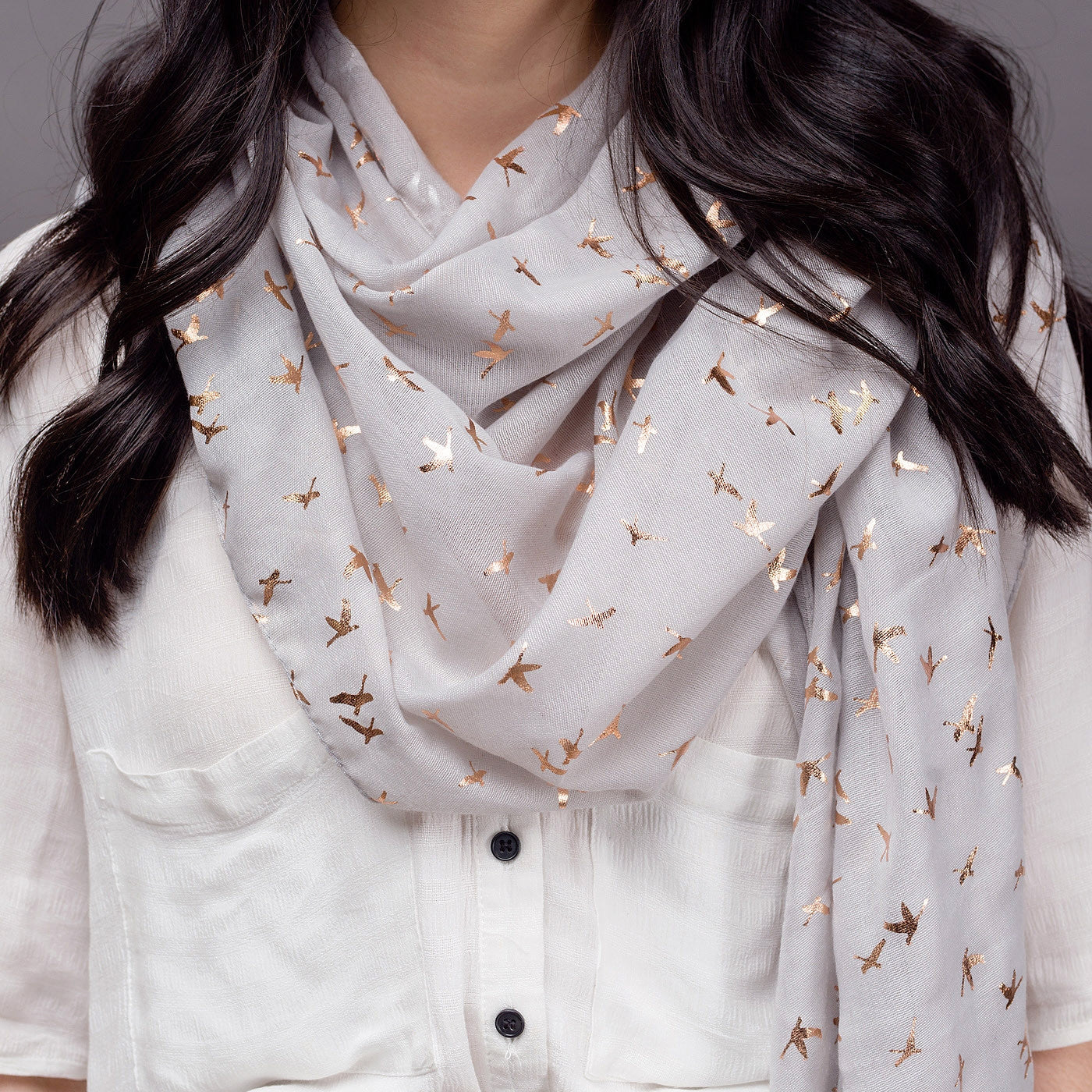 grey scarf finely detailed rose gold flying swan design
