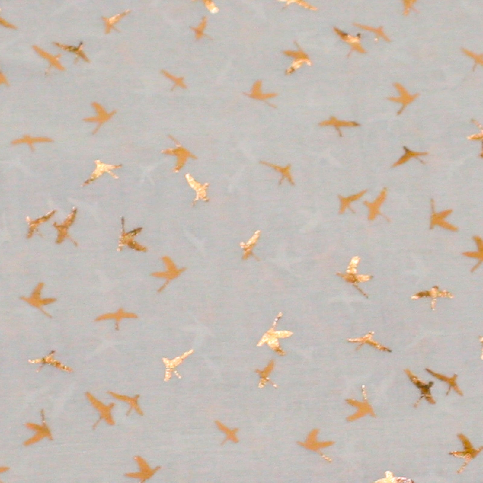 grey scarf finely detailed rose gold flying swan design close up