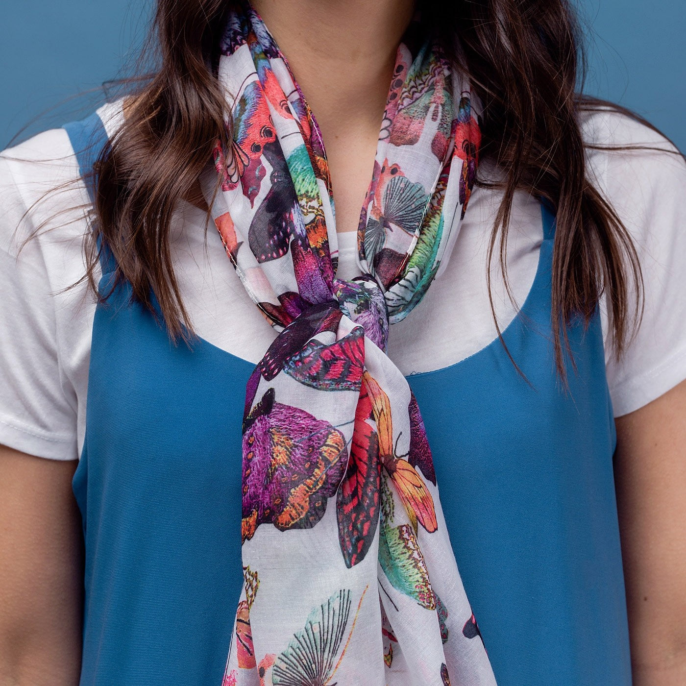 Delicate butterfly print scarf in white with rolled edge.