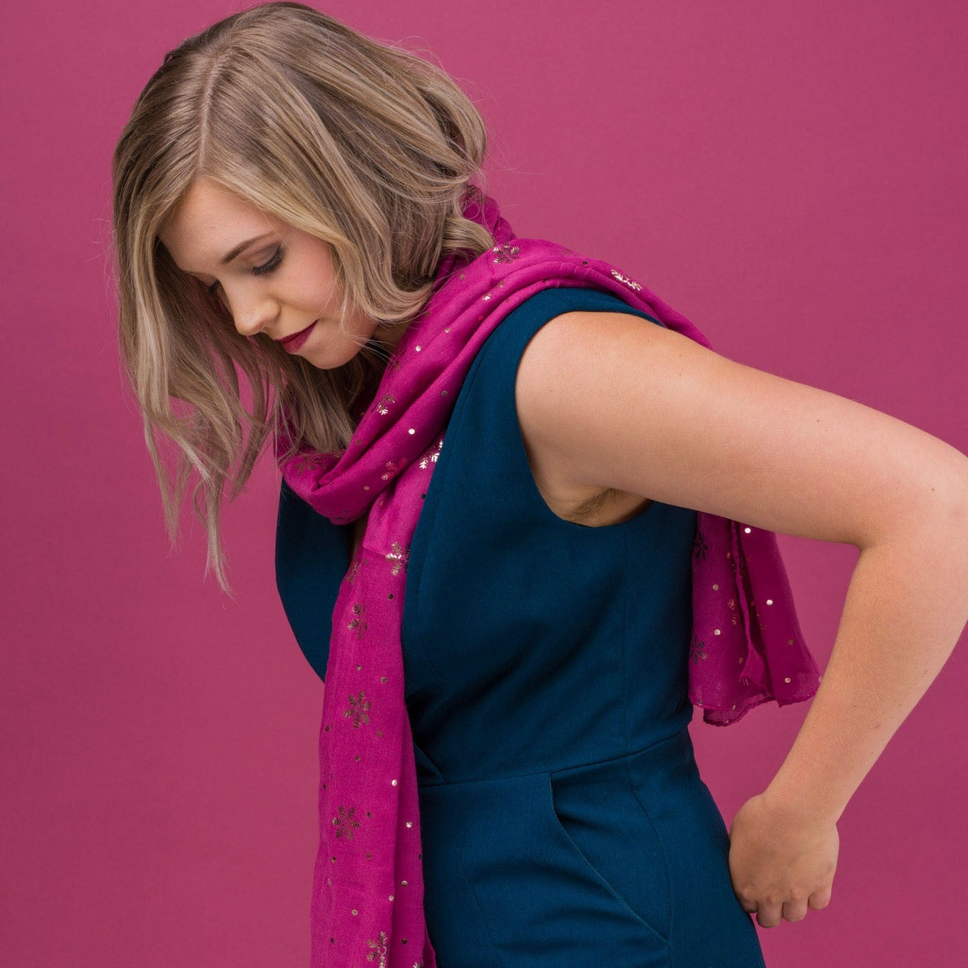 Delicate snowflake foil print pink scarf, finished with a rolled edge.